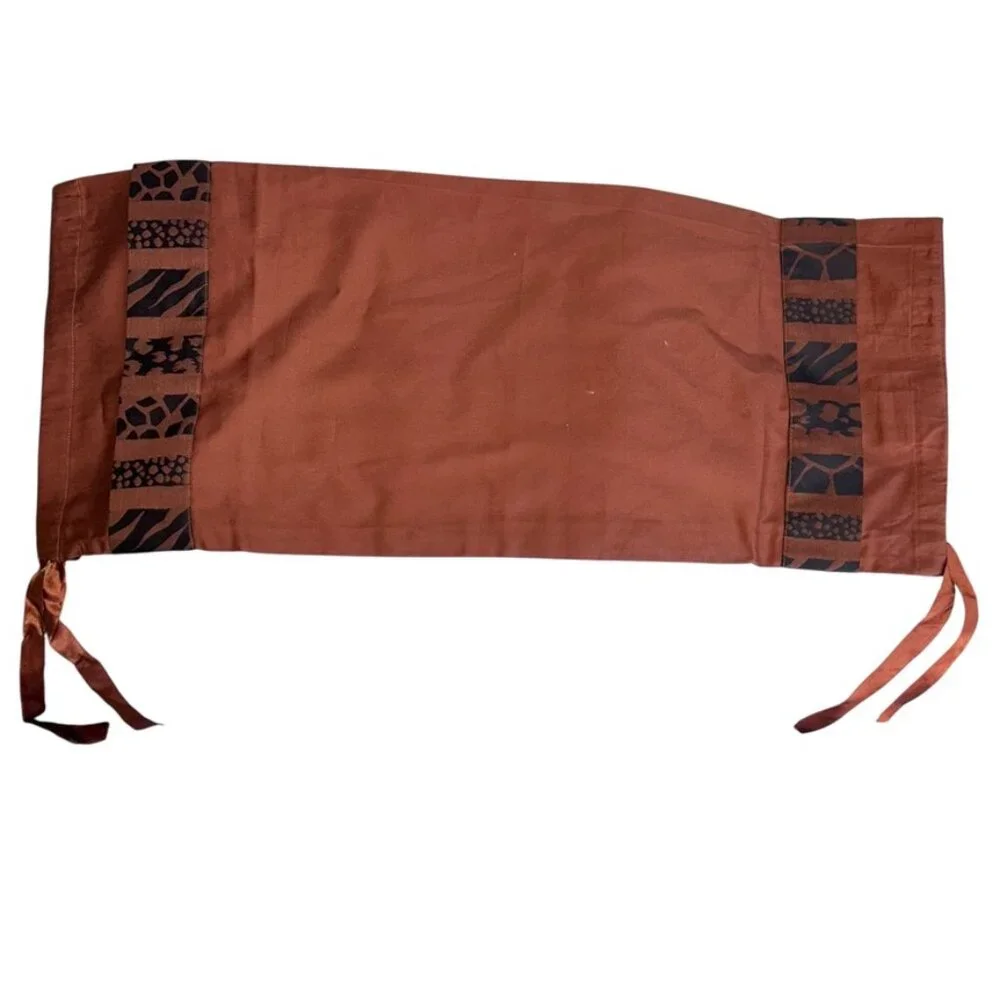 Gracious Home New York rust brown black African Animal print trim roll pillow